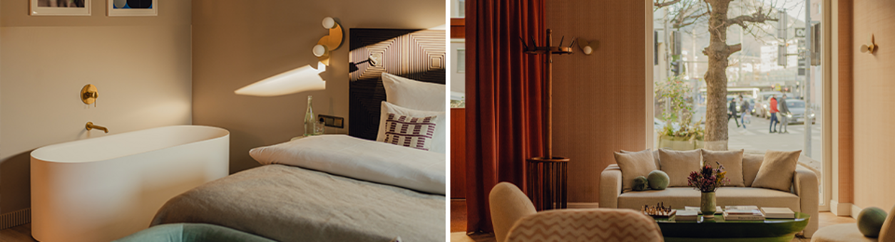 Hotelbett mit freistehender Badewanne und Couch im Foyer